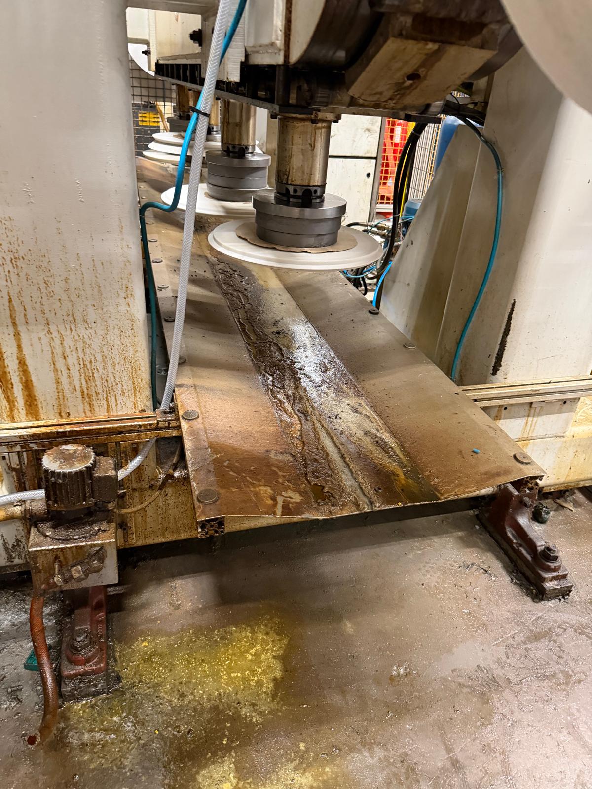 Before cleaning: Machine bed and swarf tray